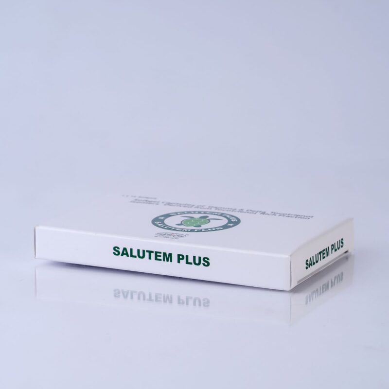 A white box with a green logo of a plant sits on a table. The text "Salutem Plus" is written on the box.